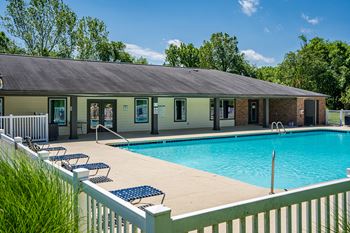 Fenced In Pool Area with with Lounge Furniture